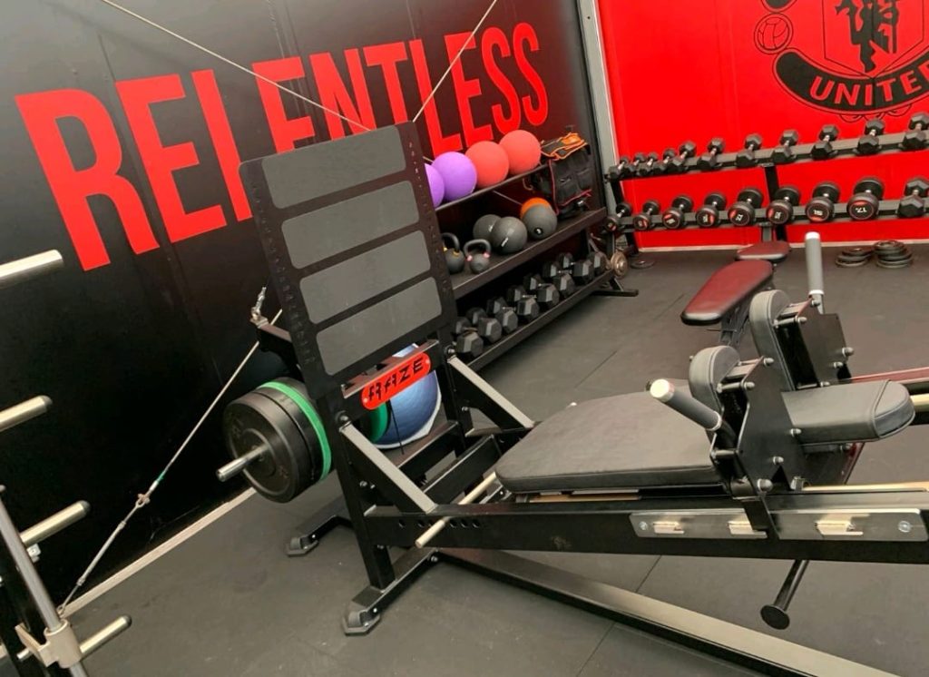 Gym installation high-performance strength area for Manchester United Women&rsquo;s FC, luxury fitness space.